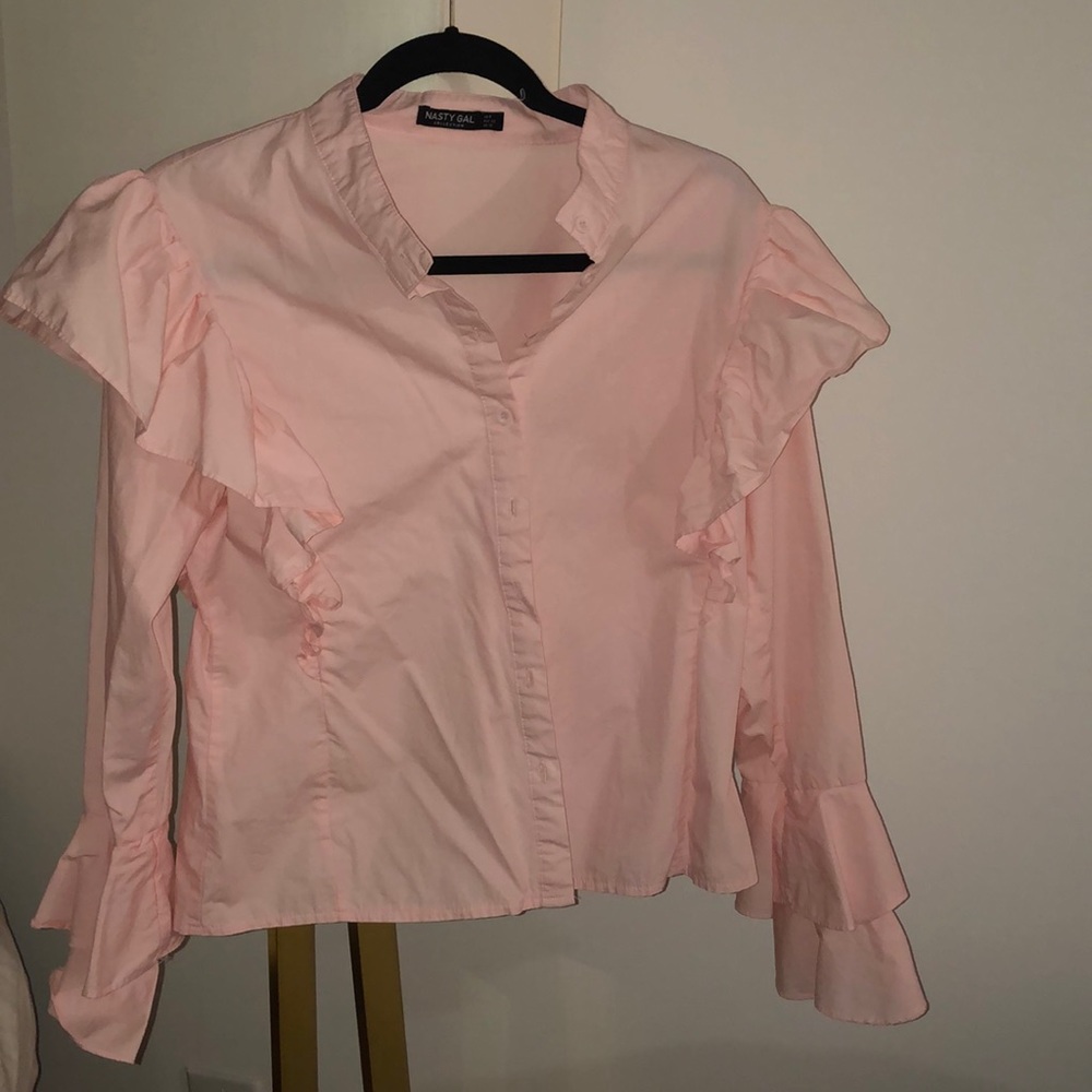 Pink ruffled blouse